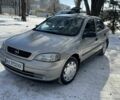 Серый Опель Астра, объемом двигателя 1.4 л и пробегом 210 тыс. км за 3000 $, фото 1 на Automoto.ua