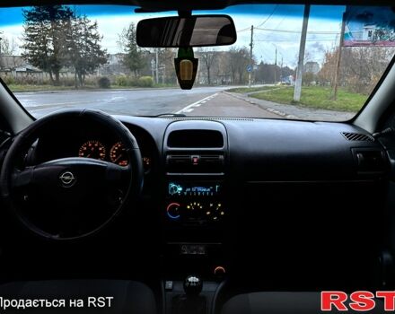 Серый Опель Астра, объемом двигателя 1.4 л и пробегом 201 тыс. км за 3450 $, фото 10 на Automoto.ua