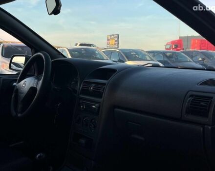 Серый Опель Астра, объемом двигателя 1.4 л и пробегом 280 тыс. км за 4390 $, фото 33 на Automoto.ua