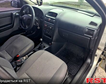 Серый Опель Астра, объемом двигателя 1.4 л и пробегом 183 тыс. км за 4200 $, фото 8 на Automoto.ua