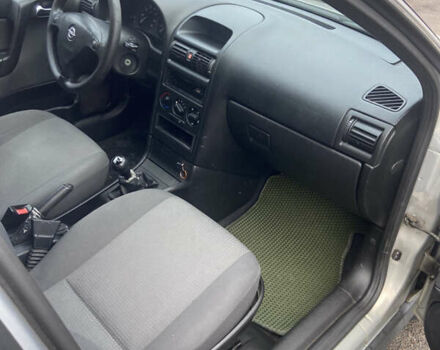 Серый Опель Астра, объемом двигателя 1.4 л и пробегом 104 тыс. км за 3900 $, фото 11 на Automoto.ua