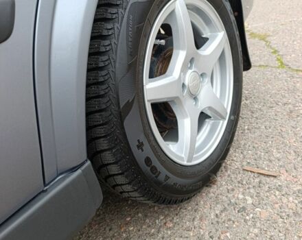 Серый Опель Астра, объемом двигателя 1.4 л и пробегом 77 тыс. км за 4400 $, фото 6 на Automoto.ua