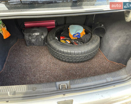 Серый Опель Астра, объемом двигателя 1.4 л и пробегом 326 тыс. км за 4200 $, фото 11 на Automoto.ua