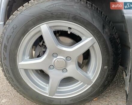 Серый Опель Астра, объемом двигателя 1.4 л и пробегом 77 тыс. км за 4400 $, фото 6 на Automoto.ua