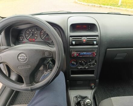 Серый Опель Астра, объемом двигателя 1.4 л и пробегом 77 тыс. км за 4400 $, фото 11 на Automoto.ua
