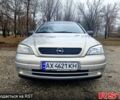 Серый Опель Астра, объемом двигателя 1.4 л и пробегом 183 тыс. км за 4200 $, фото 2 на Automoto.ua