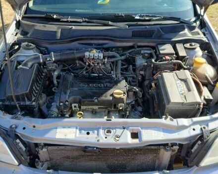 Серый Опель Астра, объемом двигателя 1.4 л и пробегом 213 тыс. км за 3700 $, фото 11 на Automoto.ua