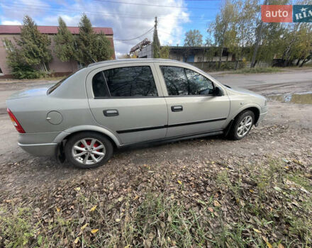 Серый Опель Астра, объемом двигателя 1.4 л и пробегом 326 тыс. км за 4200 $, фото 5 на Automoto.ua