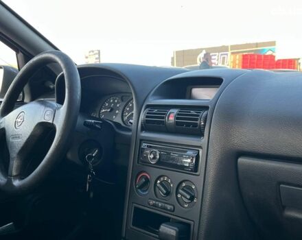 Серый Опель Астра, объемом двигателя 1.4 л и пробегом 280 тыс. км за 4390 $, фото 37 на Automoto.ua