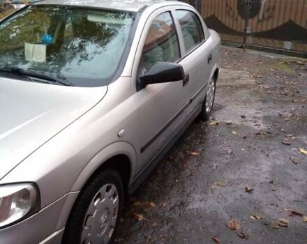 Серый Опель Астра, объемом двигателя 1.4 л и пробегом 119 тыс. км за 5000 $, фото 2 на Automoto.ua