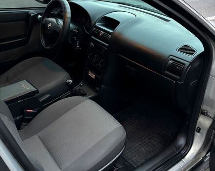 Серый Опель Астра, объемом двигателя 1.4 л и пробегом 201 тыс. км за 3450 $, фото 11 на Automoto.ua