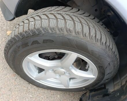 Серый Опель Астра, объемом двигателя 1.4 л и пробегом 77 тыс. км за 4400 $, фото 7 на Automoto.ua