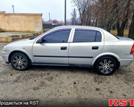 Серый Опель Астра, объемом двигателя 1.4 л и пробегом 183 тыс. км за 4200 $, фото 6 на Automoto.ua