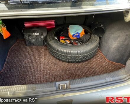 Серый Опель Астра, объемом двигателя 1.4 л и пробегом 326 тыс. км за 4200 $, фото 11 на Automoto.ua