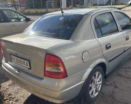 Серый Опель Астра, объемом двигателя 1.4 л и пробегом 326 тыс. км за 4200 $, фото 3 на Automoto.ua