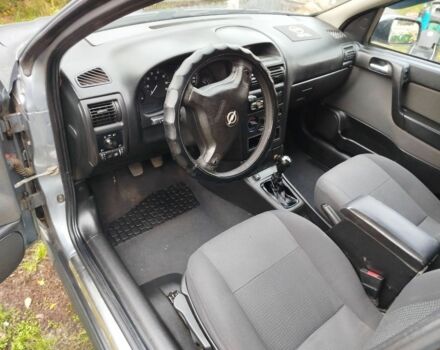 Серый Опель Астра, объемом двигателя 1.6 л и пробегом 256 тыс. км за 3500 $, фото 11 на Automoto.ua