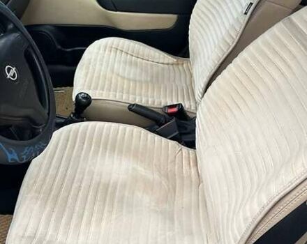 Серый Опель Астра, объемом двигателя 1.6 л и пробегом 179 тыс. км за 4000 $, фото 24 на Automoto.ua