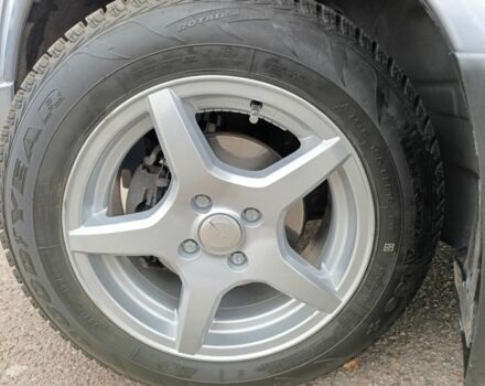 Серый Опель Астра, объемом двигателя 1.4 л и пробегом 77 тыс. км за 4400 $, фото 5 на Automoto.ua