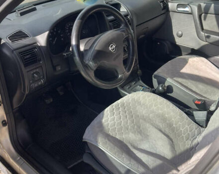 Серый Опель Астра, объемом двигателя 1.4 л и пробегом 326 тыс. км за 4200 $, фото 10 на Automoto.ua