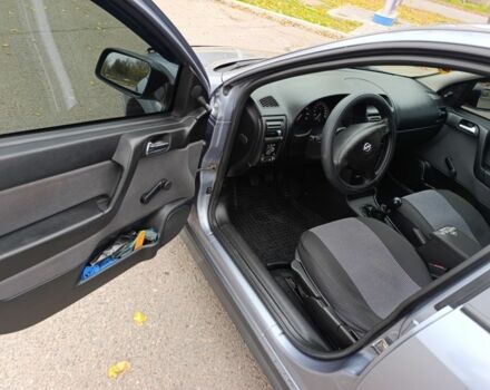 Серый Опель Астра, объемом двигателя 1.4 л и пробегом 77 тыс. км за 4400 $, фото 9 на Automoto.ua