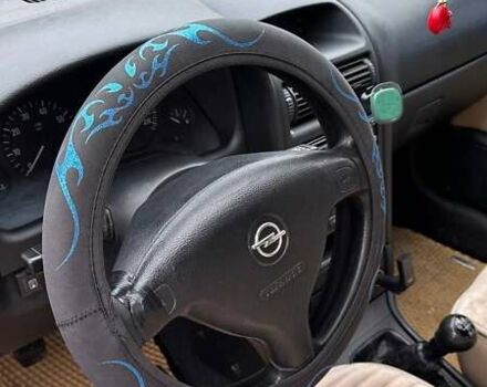 Серый Опель Астра, объемом двигателя 1.6 л и пробегом 179 тыс. км за 4000 $, фото 25 на Automoto.ua