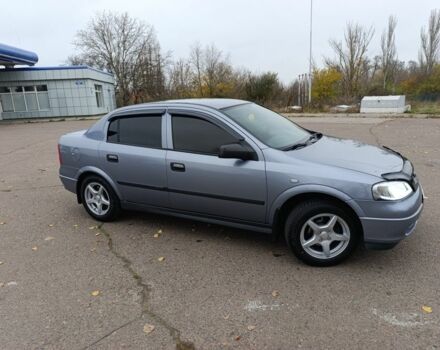 Серый Опель Астра, объемом двигателя 1.4 л и пробегом 77 тыс. км за 4400 $, фото 4 на Automoto.ua