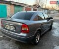 Серый Опель Астра, объемом двигателя 1.4 л и пробегом 180 тыс. км за 1750 $, фото 1 на Automoto.ua