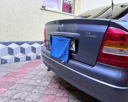 Серый Опель Астра, объемом двигателя 1.4 л и пробегом 201 тыс. км за 3600 $, фото 10 на Automoto.ua