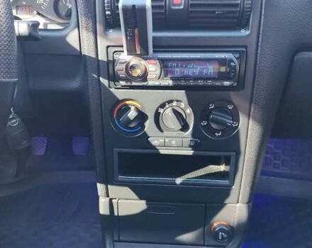 Серый Опель Астра, объемом двигателя 1.4 л и пробегом 213 тыс. км за 3700 $, фото 8 на Automoto.ua