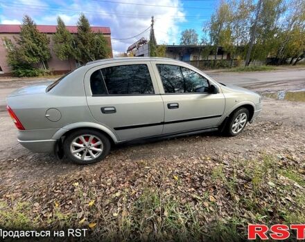 Серый Опель Астра, объемом двигателя 1.4 л и пробегом 326 тыс. км за 4200 $, фото 2 на Automoto.ua