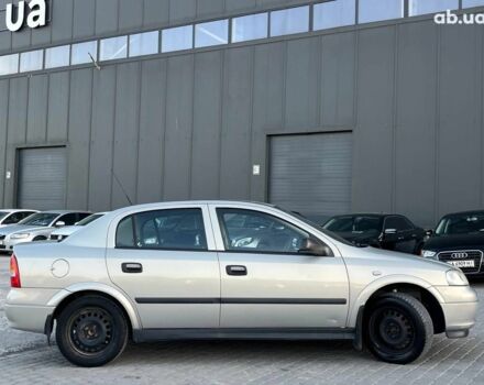 Серый Опель Астра, объемом двигателя 1.4 л и пробегом 280 тыс. км за 4390 $, фото 4 на Automoto.ua