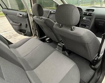 Серый Опель Астра, объемом двигателя 1.6 л и пробегом 47 тыс. км за 5900 $, фото 7 на Automoto.ua