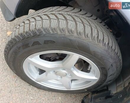 Серый Опель Астра, объемом двигателя 1.4 л и пробегом 77 тыс. км за 4400 $, фото 8 на Automoto.ua