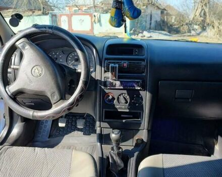 Серый Опель Астра, объемом двигателя 1.4 л и пробегом 213 тыс. км за 3700 $, фото 5 на Automoto.ua