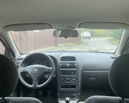 Серый Опель Астра, объемом двигателя 1.4 л и пробегом 104 тыс. км за 3900 $, фото 15 на Automoto.ua