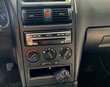 Серый Опель Астра, объемом двигателя 1.4 л и пробегом 326 тыс. км за 4200 $, фото 6 на Automoto.ua