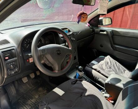 Серый Опель Астра, объемом двигателя 1.4 л и пробегом 201 тыс. км за 3600 $, фото 11 на Automoto.ua