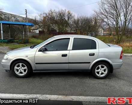 Серый Опель Астра, объемом двигателя 1.4 л и пробегом 201 тыс. км за 3450 $, фото 4 на Automoto.ua