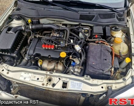 Серый Опель Астра, объемом двигателя 1.4 л и пробегом 183 тыс. км за 4200 $, фото 10 на Automoto.ua