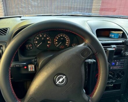 Серый Опель Астра, объемом двигателя 1.4 л и пробегом 201 тыс. км за 3600 $, фото 15 на Automoto.ua