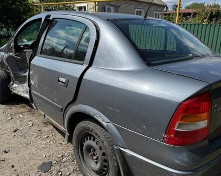 Серый Опель Астра, объемом двигателя 1.4 л и пробегом 122 тыс. км за 1500 $, фото 9 на Automoto.ua