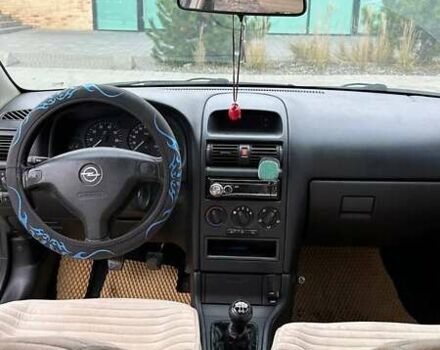 Серый Опель Астра, объемом двигателя 1.6 л и пробегом 179 тыс. км за 4000 $, фото 26 на Automoto.ua