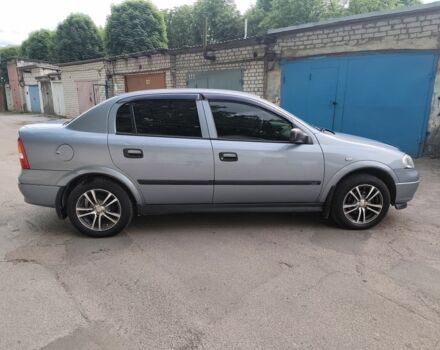 Серый Опель Астра, объемом двигателя 1.4 л и пробегом 73 тыс. км за 5200 $, фото 2 на Automoto.ua