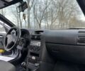 Серый Опель Астра, объемом двигателя 1.4 л и пробегом 180 тыс. км за 4400 $, фото 6 на Automoto.ua