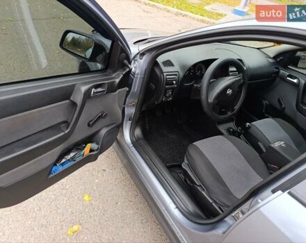 Серый Опель Астра, объемом двигателя 1.4 л и пробегом 77 тыс. км за 4400 $, фото 9 на Automoto.ua