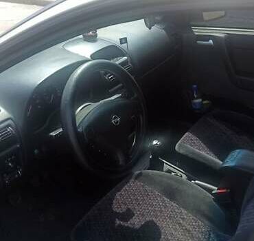 Серый Опель Астра, объемом двигателя 1.4 л и пробегом 387 тыс. км за 3700 $, фото 3 на Automoto.ua