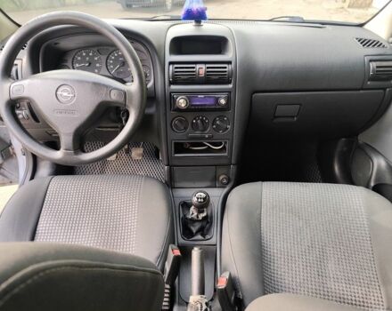 Серый Опель Астра, объемом двигателя 1.4 л и пробегом 73 тыс. км за 5200 $, фото 6 на Automoto.ua