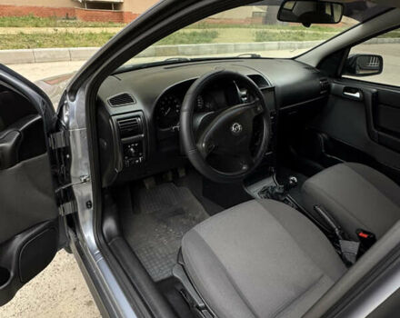 Серый Опель Астра, объемом двигателя 1.6 л и пробегом 113 тыс. км за 5500 $, фото 8 на Automoto.ua