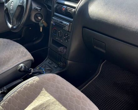 Серый Опель Астра, объемом двигателя 1.4 л и пробегом 326 тыс. км за 4200 $, фото 4 на Automoto.ua