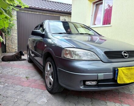 Серый Опель Астра, объемом двигателя 1.4 л и пробегом 201 тыс. км за 3600 $, фото 4 на Automoto.ua